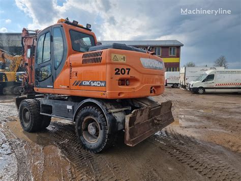 Koparka kołowa Doosan DX140W Rototilt na sprzedaż Litwa Kužiai