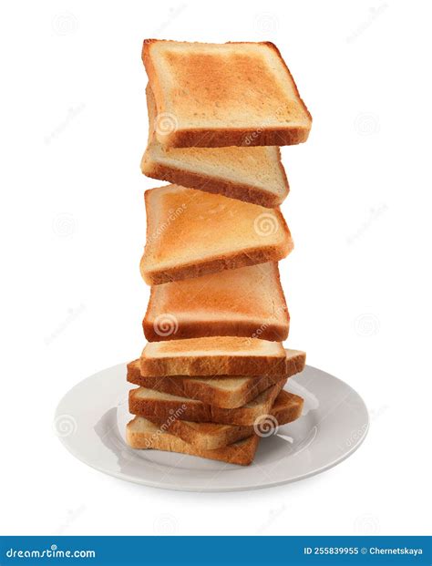 Delicious Toasted Bread Falling Into Plate On White Background Stock