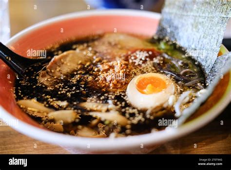 A Bowl Of Tonkotsu Ramen With Black Garlic Oil Chargrilled Chashu