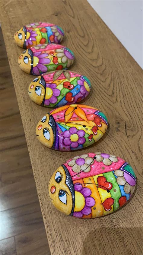 35 Super Colorful Flower Painted Rocks For Inspiration Artofit