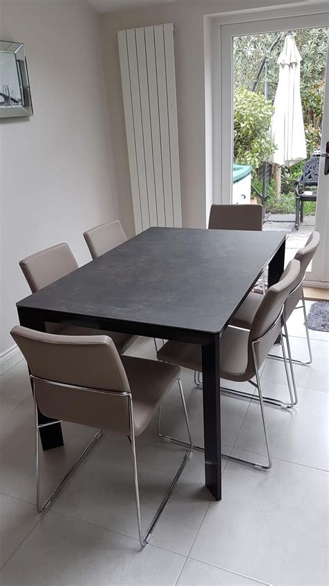 Modern extendable dining table. Our Urban ceramic top extendable table ...