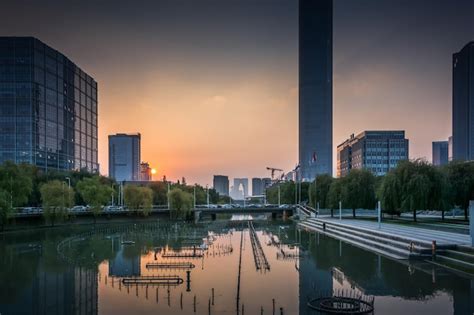 Premium Photo Modern Business Building In Sunset