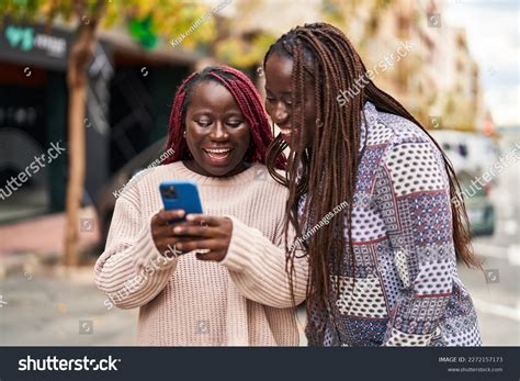 African American Women Friends Smiling Confident Stock Photo