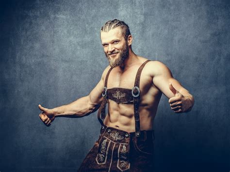 Premium Photo Portrait Of A Athleltic Muscular Bearded Man Posing