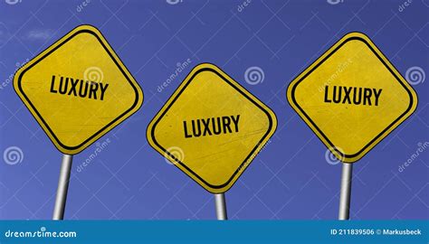 Luxury Three Yellow Signs With Blue Sky Background Stock Photo