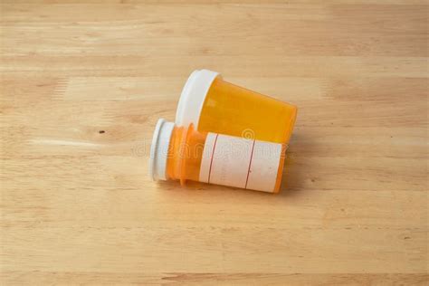 Old Child Proof Pill Bottles On A Table Stock Photo Image Of