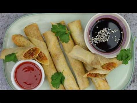 Some Food Is Sitting On A Plate With Dipping Sauce