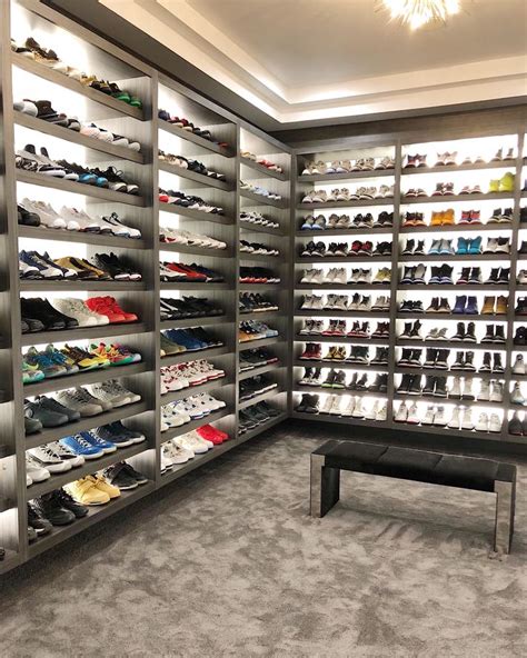 A Room Filled With Lots Of Shoes On Shelves