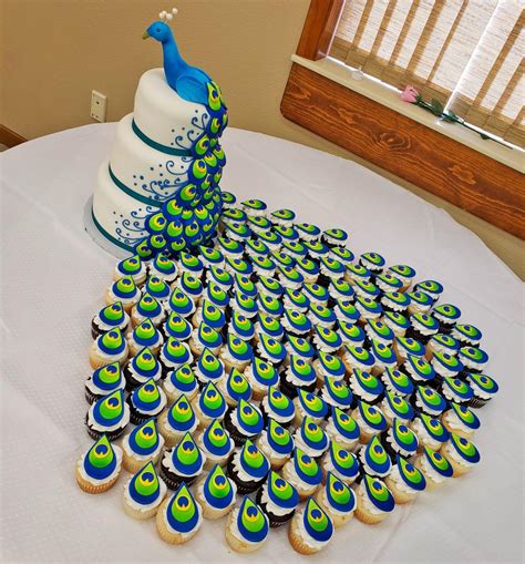 This Incredible Peacock Wedding Cake Uses Cupcakes For The Tail