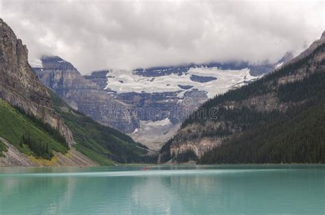 Lake Louise In Cloudy Day In Summer In Banff National Park Stock Photo