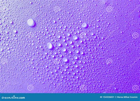 Drops Of Water On A Purple Glass Texture Background Stock Image Image Of Artistic Circle