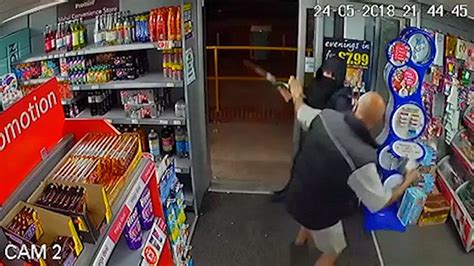 Shopkeeper Filmed Fighting Back Against Armed Robber Demanding Cash