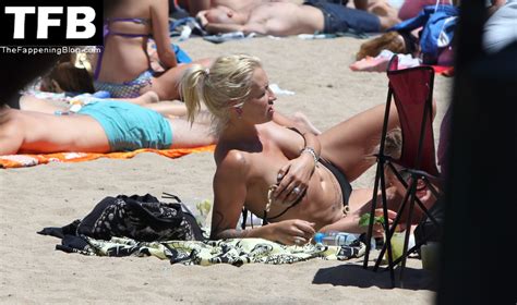 Sarah Connor Flashes Her Nude Breasts On The Beach Photos