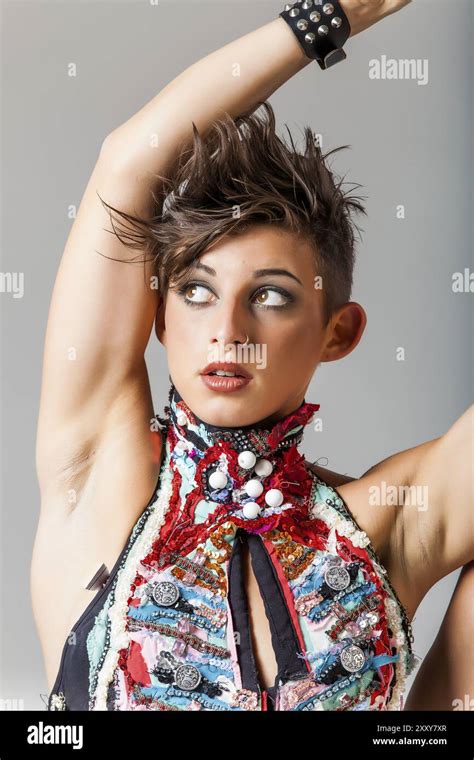 Pretty Brunette Punk Woman In A Sporty And Flexible Pose Stock Photo Alamy