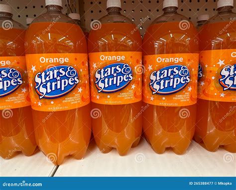 Display Of Orange Soda Stars And Stripes Brand In 2 Liter Bottles At