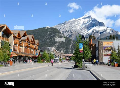 Banff Avenue The Central Street Of Downtown Banff In Canada In A Sunny