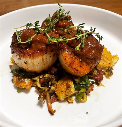 Seared Sea Scallops Balsamic Glazed Brussels Sprouts And A Tomato Red