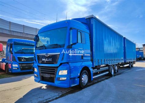 MAN TGX 26 460 6x2 LL Jumbo Zug Retarder Klima Curtainsider Truck