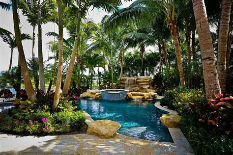 Tropical Pool And Greenery Around It Allow You To Enjoy A Luxurious