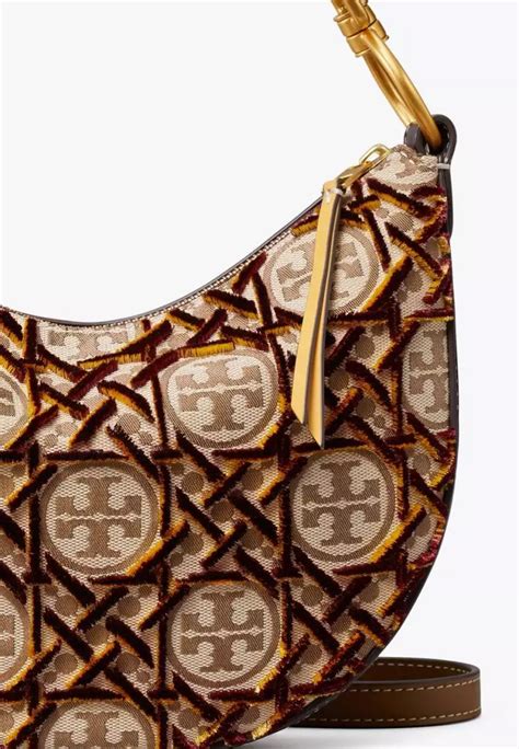 Jual Tory Burch Tory Burch T Monogram Fil Couple Mini Crescent Bag Hazelnut Original 2023