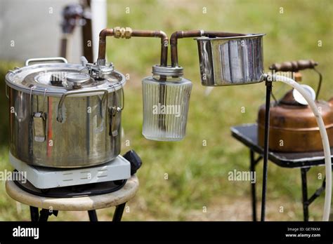 Moonshine still Stock Photo - Alamy