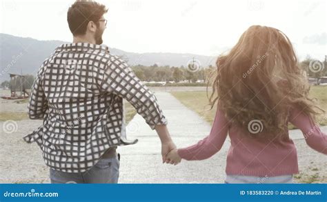 Romantic Loving Couple Running And Holding Hands Stock Footage Video