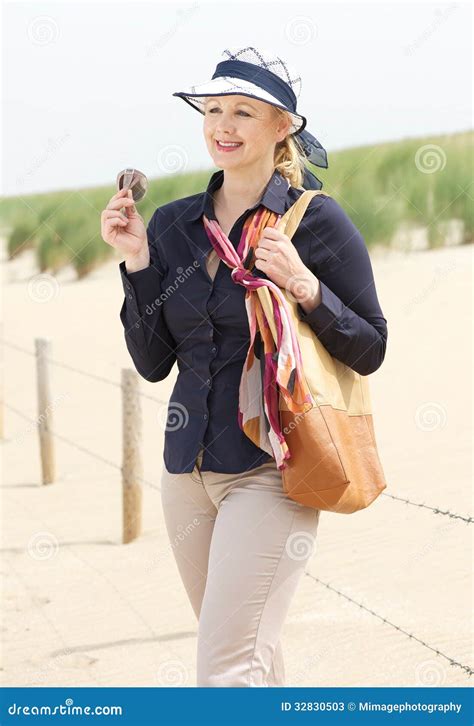 Attractive Older Woman Standing At The Beach Stock Image Image Of