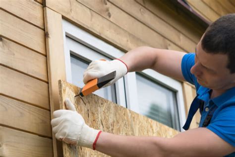 How To Protect Windows From Storms Hurricane Shutters Modernize