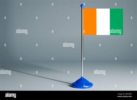 The 3d Rendering Realistic National Flag Of Cote D Ivoire On Steel Pole