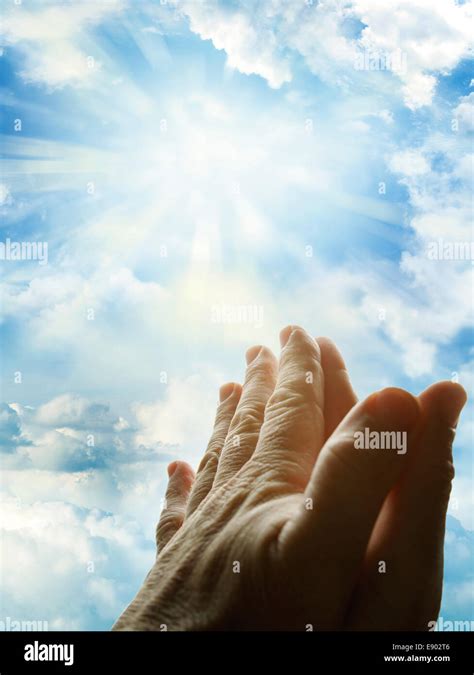 Prayer hands heaven hi-res stock photography and images - Alamy