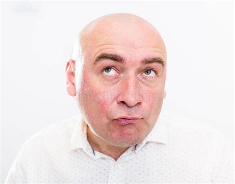 Portrait Of Bald Adult Mature Man With Emotions On White Background