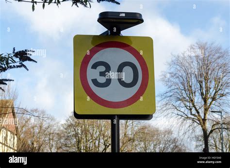 Sign Warning Of 30 Mph Speed Limit Stock Photo Alamy