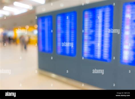 Abstract Blur Flight Information Screen In Airport Terminal Stock Photo