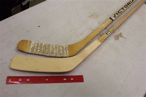 Two Vintage Wooden Hockey Sticks