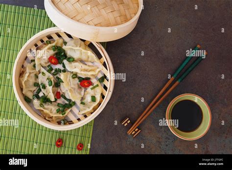 Steamed Chinese Dumplings In Bamboo Steaming Basket Top View Blank