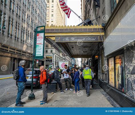 Unidentified Migrants in Front of New York City S New Migrant Welcome Center at the Former Four ...