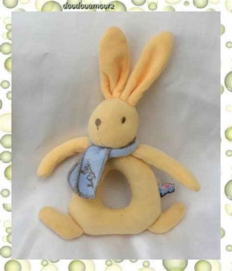 Doudou Peluche Lapin Hochet Triangle Jaune Echarpe Bleu Sucre D Orge