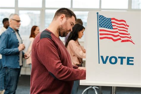 Premium Photo Attractive Middle Aged Man Standing In Voting Booth