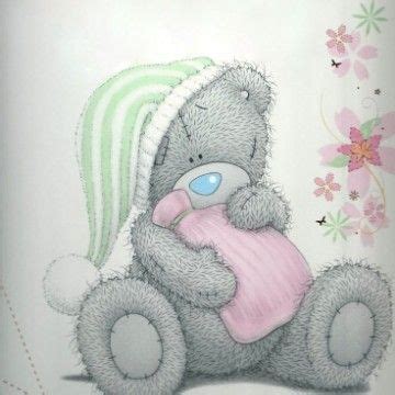 A Drawing Of A Teddy Bear Holding A Baby Blanket With Flowers In The