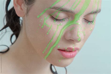 Green Liquid Over Beautiful Face By Stocksy Contributor Sonja Lekovic Stocksy