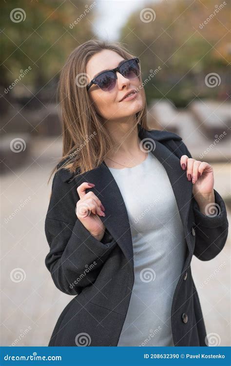 Beautiful And Cute Blonde Girl With Pleasure Posing On The Street Stock Photo Image Of