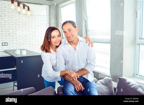 Mature Couple Happy Hugging Indoors Stock Photo Alamy