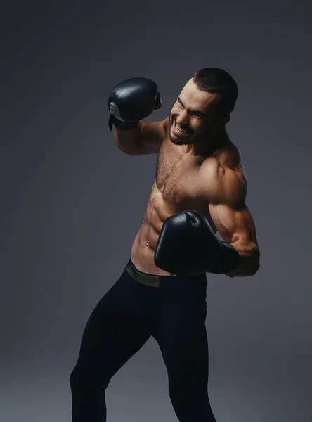 A Brutal Athletic Bearded Shirtless Male Posing With A Medball O Stock