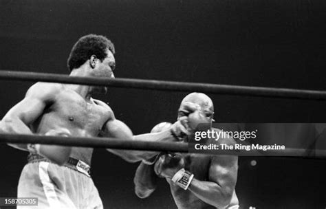 George Foreman Connects With A Left Hook To Joe Frazier During The