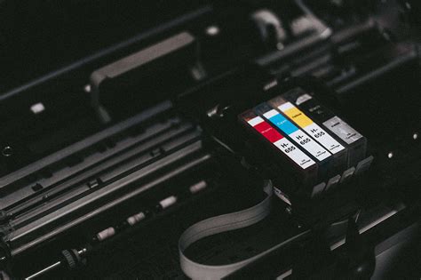 Cmyk Ink Cartridges In A Printer Free Stock Photo Picjumbo