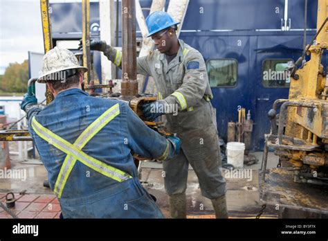 Oil Workers Drilling For Oil On Rig Stock Photo Alamy