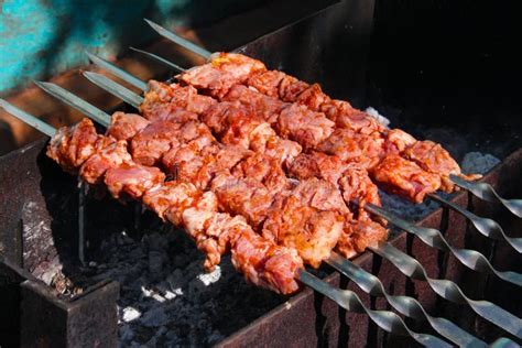 Grilling Skewers or Shashlik on Barbecue Grill. Selective Focus Stock ...