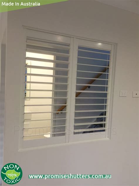 Two Panels Three Panels Installed With Pivot Hinges And Fixed Window Shutters With Beadings