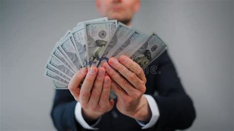 Formally Dressed Man Is Counting Us Dollar Bills Close Up Stock Video