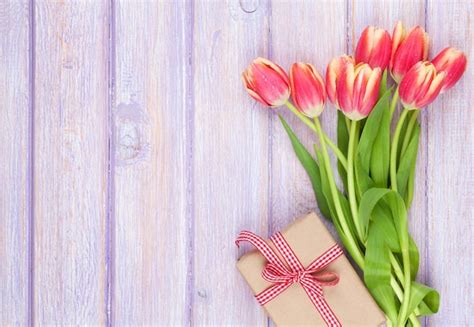 Premium Photo Colorful Tulips And Gift Box On Wooden Table